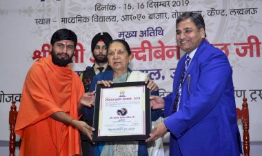 Taking award from Governor of UttarPradesh at Lucknow