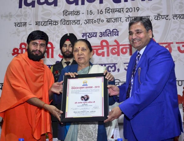 Taking award from Governor of UttarPradesh at Lucknow