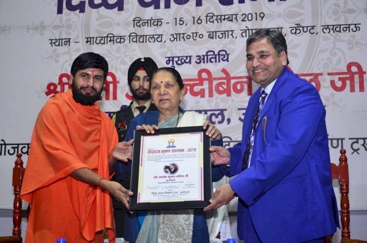 Taking award from Governor of UttarPradesh at Lucknow